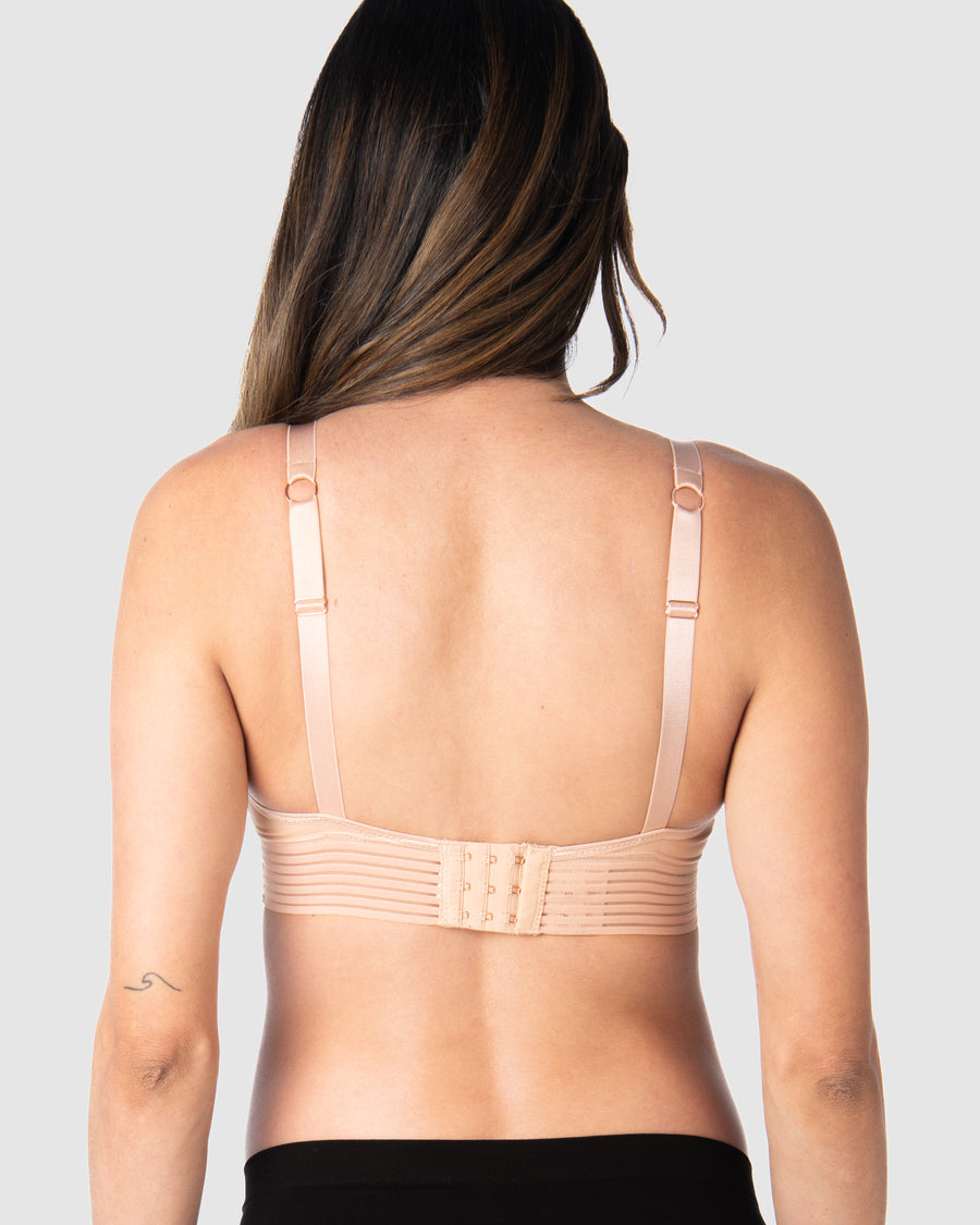 Kami, expecting mother of 2, demonstrating the versatile standard or convertible racerback feature of Hotmilk NZ's Ambition T-Shirt Wirefree nursing and maternity bra in shell pink, designed for maternity, nursing, and breastfeeding comfort