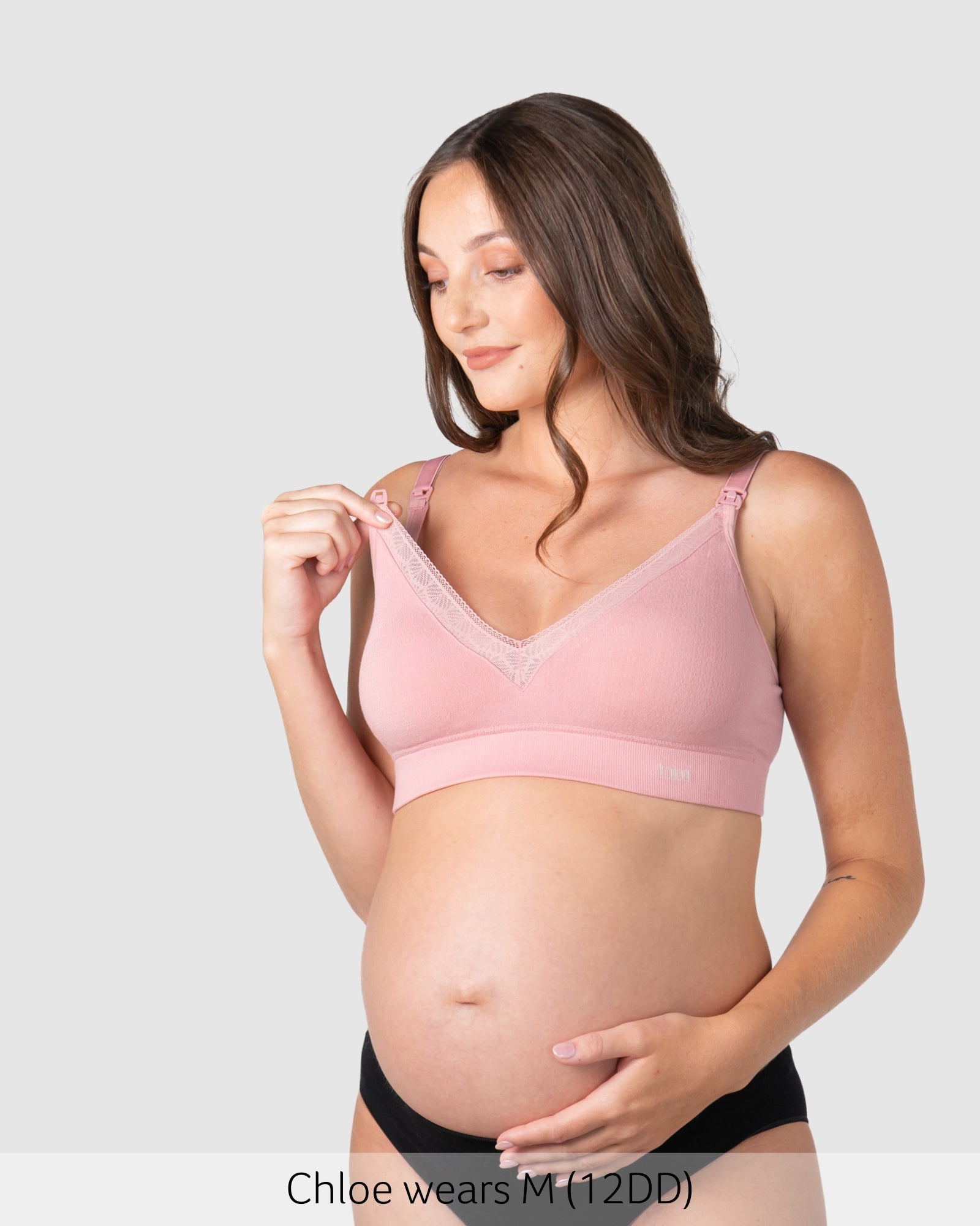 Pregnant woman wearing a hotmilk caress nursing bra by hotmilk