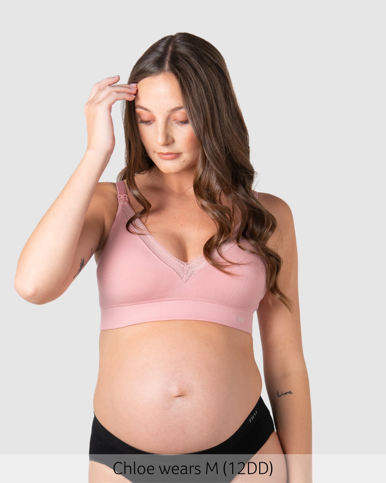 Pregnant woman wearing a hotmilk caress nursing bra by hotmilk