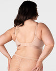 Rear view of model wearing the Hotmilk Flawless Plunge Wirefree Nursing Bra in Cashmere – showing 6-hook back closure, gold adjustable straps, and double-layer smoothing back panel with matching lace briefs