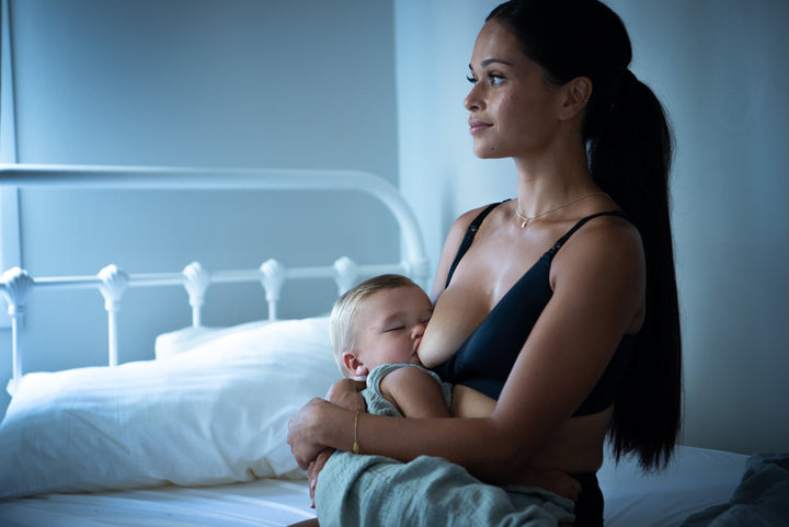 Mother Breastfeeds her Baby While He Sleeps. Wearing Hotmilk Infinite Nursing Bra