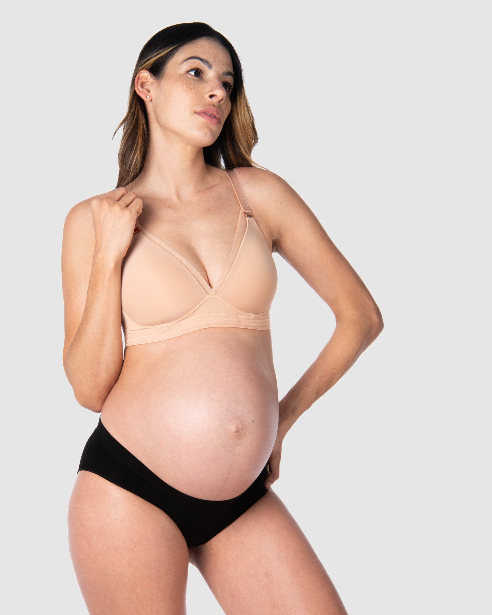 Kami, pregnant mother of 2, showcasing the full-body view of Hotmilk NZ&#39;s Ambition T-Shirt Wirefree nursing and maternity bra in shell, thoughtfully crafted for maternity, nursing, and breastfeeding comfort