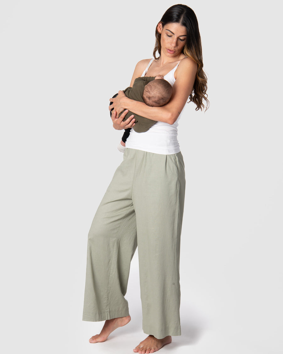 Kami, a mother of 2, loves the comfort of the new Hotmilk 'Sage Lounge Pant,' paired with the Hotmilk My Necessity nursing cami, creating the ultimate postpartum lounge set. These pants are the embodiment of sumptuous comfort, featuring a soft waistband and a flattering 7/8 length that combines style and relaxation seamlessly. Discover the perfect loungewear for pregnancy breastfeeding and postpartum comfort with Hotmilk's Sage Lounge Pant