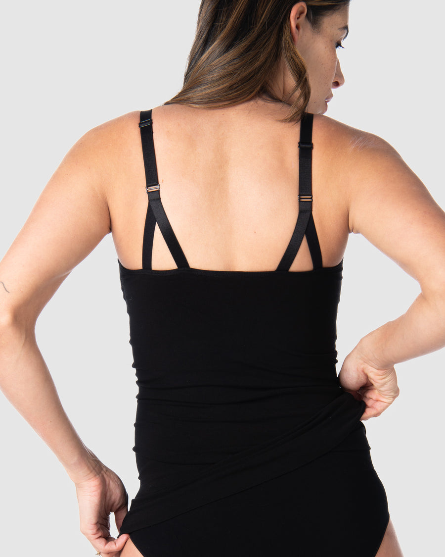 Rear view of the My Necessity Camisole by Hotmilk Lingerie NZ in black. This camisole serves as the ideal base layer, featuring a long line design that covers a pregnant belly and offers postpartum comfort and support