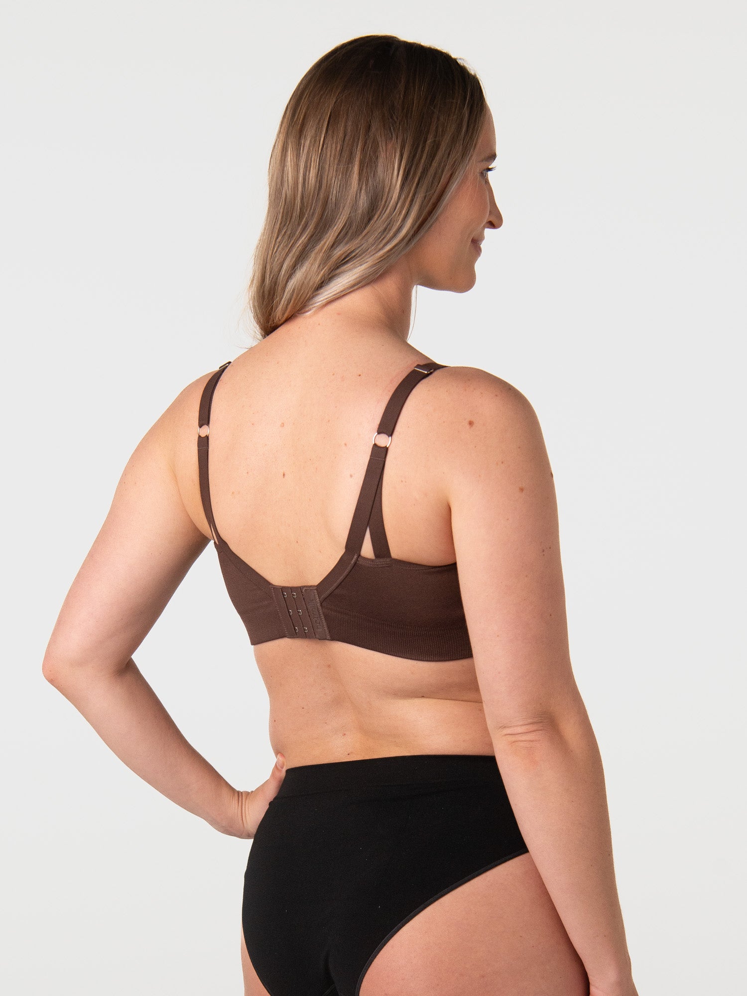 Bride wears My Necessity Chocolate showing back and clasps