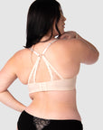 The nursing bra's soft sheer lace straps, delicately hued in shades of pink and featuring the flexibility of a convertible racerback, make it the perfect style to complement any outfit this wedding and party season. Equipped with 6 rows of hooks and eyes, it ensures flexibility throughout your pregnancy and postpartum journey. Hotmilk Lingerie NZ offers a nursing bra that harmoniously combines romantic style, flexi underwire support, and the comfort of soft cotton cups like no other