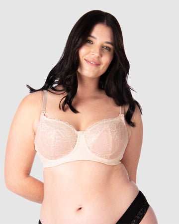 Experience complete support with Hotmilk Lingerie NZ's Temptation in Powder. This acclaimed award-winning style boasts flexi underwire, a hint of sheer lace over soft cotton cups, convenient nursing clips, and elevated all-day comfort and support. Olivia confidently wears size 14/36D in this essential nursing and maternity bra