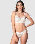 Teaming up with the Warrior Bikini Brief, Hotmilk's Warrior Soft Cup Nursing Bra seamlessly blends luxury, style, and comfort for your breastfeeding journey. Adorned with sheer lace and satin trim, this lush set is the perfect complement to enhance the radiance of a new mama like Kami. Frequently captured in stunning maternity shoots, this Hotmilk Lingerie NZ ensemble promises to elevate and support you, making it an indispensable choice for both fashion and function