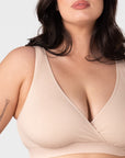 Close-up front view of the Hotmilk My Comfort Nursing Bra in Oat – showing soft ribbed bamboo-blend fabric, wide smoothing straps, and deep plunge wrap neckline