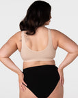 Rear view of model wearing the Hotmilk My Comfort Nursing Bra in Oat – showing smooth pullover back, wide non-adjustable straps, and seamless ribbed construction