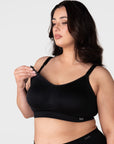 Model demonstrating nursing clip release on the Hotmilk My Everyday FlexFit Nursing Bra in Black Busty – showing one-handed breastfeeding access
