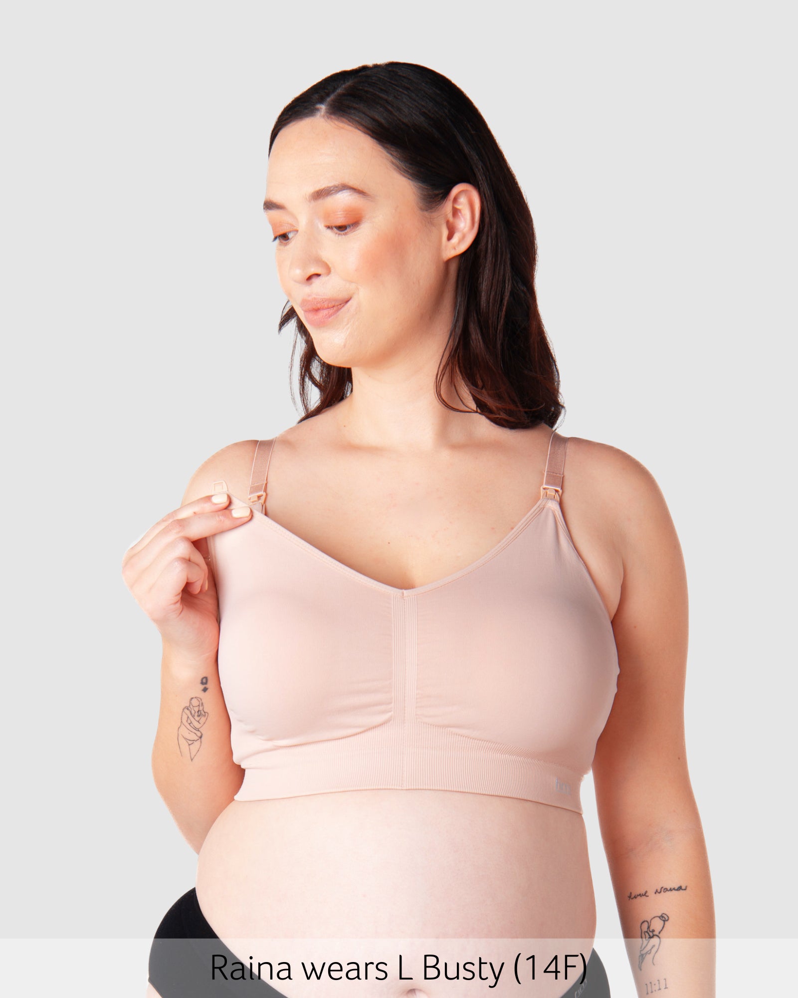 Model wearing Hotmilk My Necessity bra in Ballet Pink, showing front view with nursing clips and full cup support.