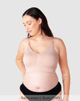 Model wearing Hotmilk My Necessity Bra in Ballet Pink showing front view with full cup support.
