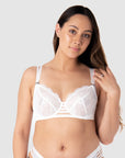 Breastfeed in style with Hotmilk Lingerie's True Luxe flexi underwire nursing bra. This bra features semi-sheer large floral lace and signature magnetic nursing clips, offering a modern twist on maternity bras that combines fashion and functionality