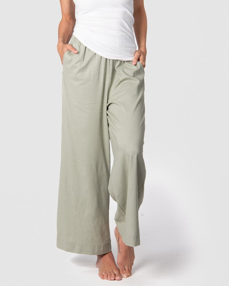 Discover Hotmilk's newest addition to their loungewear collection - the 'Lounge Pant in Sage.' Crafted from a sumptuous linen blend, this lounge pant offers both style and comfort. The soothing Sage color is perfect for relaxation. Featuring a soft, stretchy waistband, these pants are designed for ultimate comfort during your downtime.