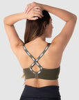 Discover the versatility of the convertible racerback straps with the Zen Olive Wirefree Sports Bra from Hotmilk Lingerie. A preferred choice for expectant and nursing mothers, this versatile bra provides outstanding support for walking and light exercise during pregnancy and throughout the breastfeeding journey